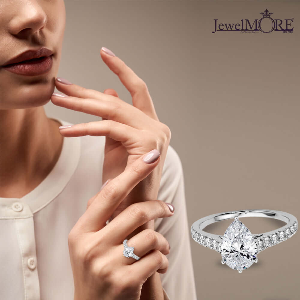 Pear Shape and Round Diamond Engagement Ring