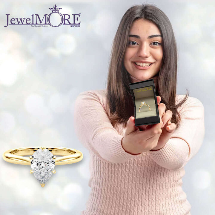 Pear Shape and Round Diamond Engagement Ring